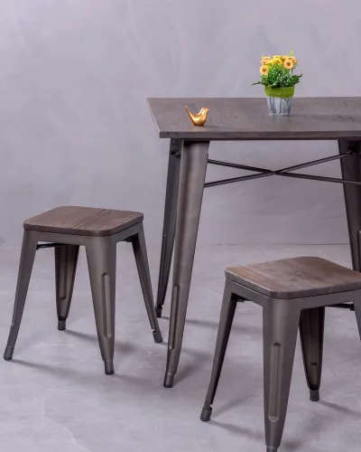 Low industrial stool in aged steel and wooden seat | Nest Dream