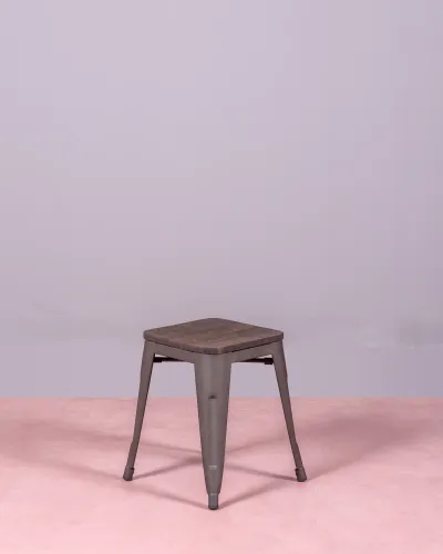 Low industrial stool in aged steel and wooden seat | Nest Dream