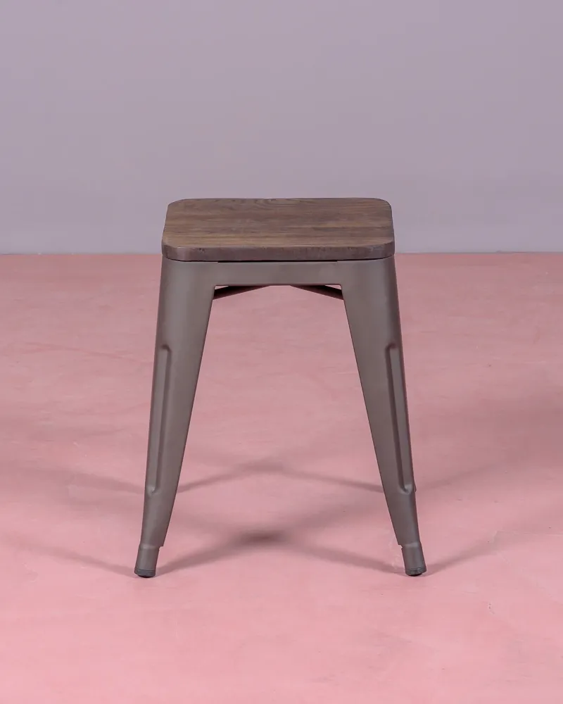 Low industrial stool in aged steel and wooden seat | Nest Dream