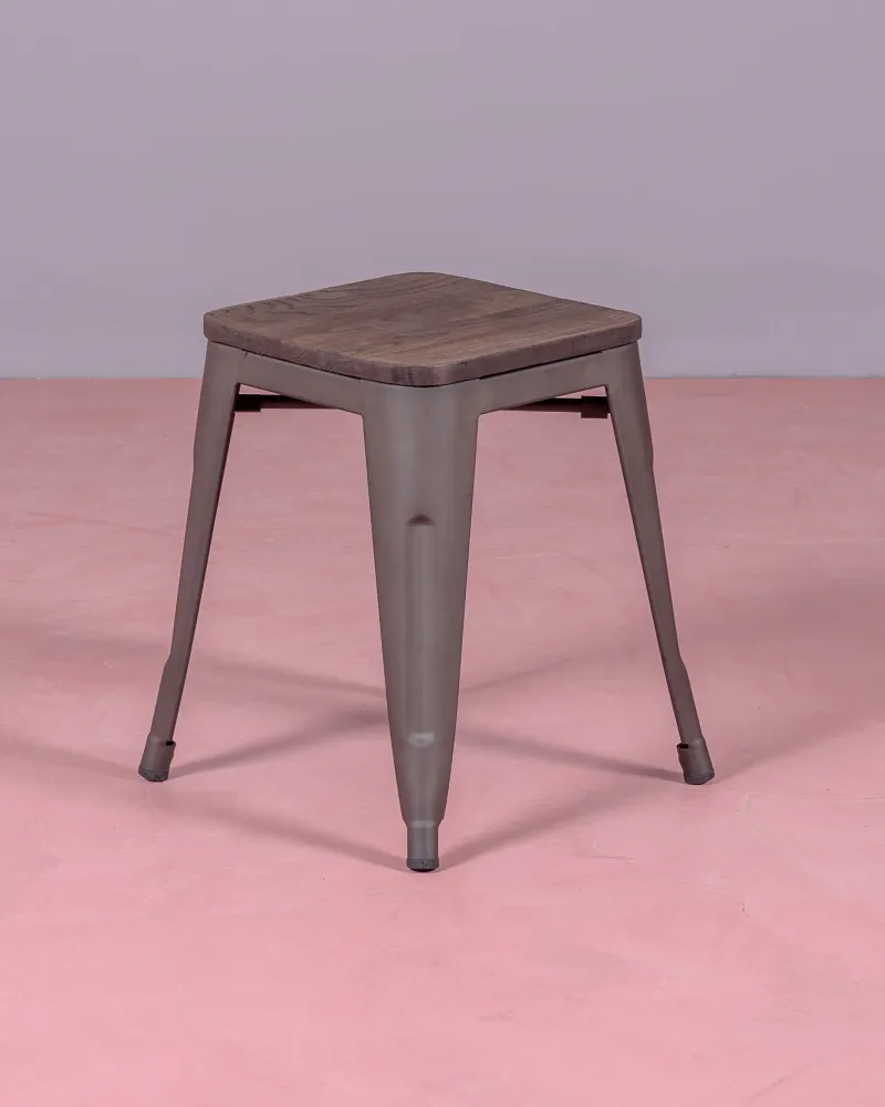 Low industrial stool in aged steel and wooden seat | Nest Dream