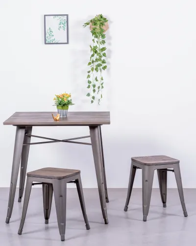 Low industrial stool in aged steel and wooden seat | Nest Dream