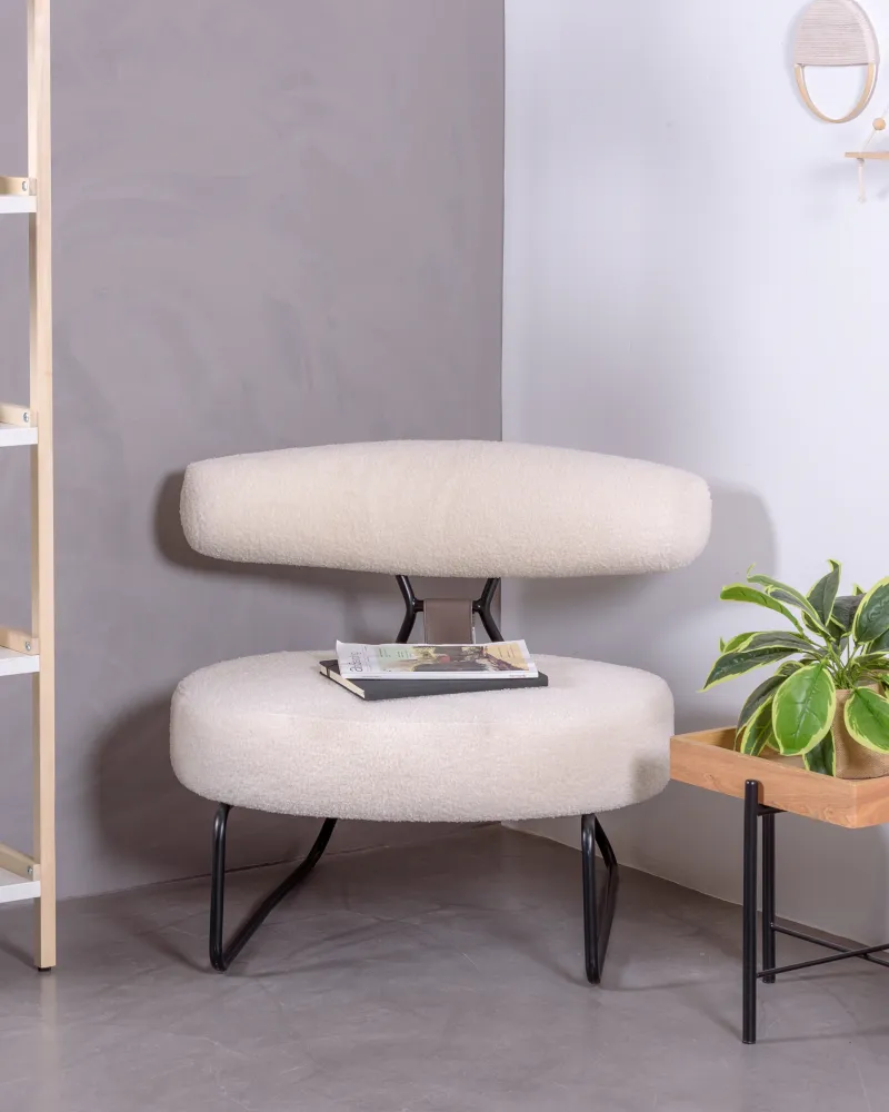 Designer armchair upholstered in bouclé | Free shipping and Return